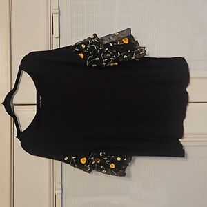 Black shirt with embroidered floral on tiered sleeves